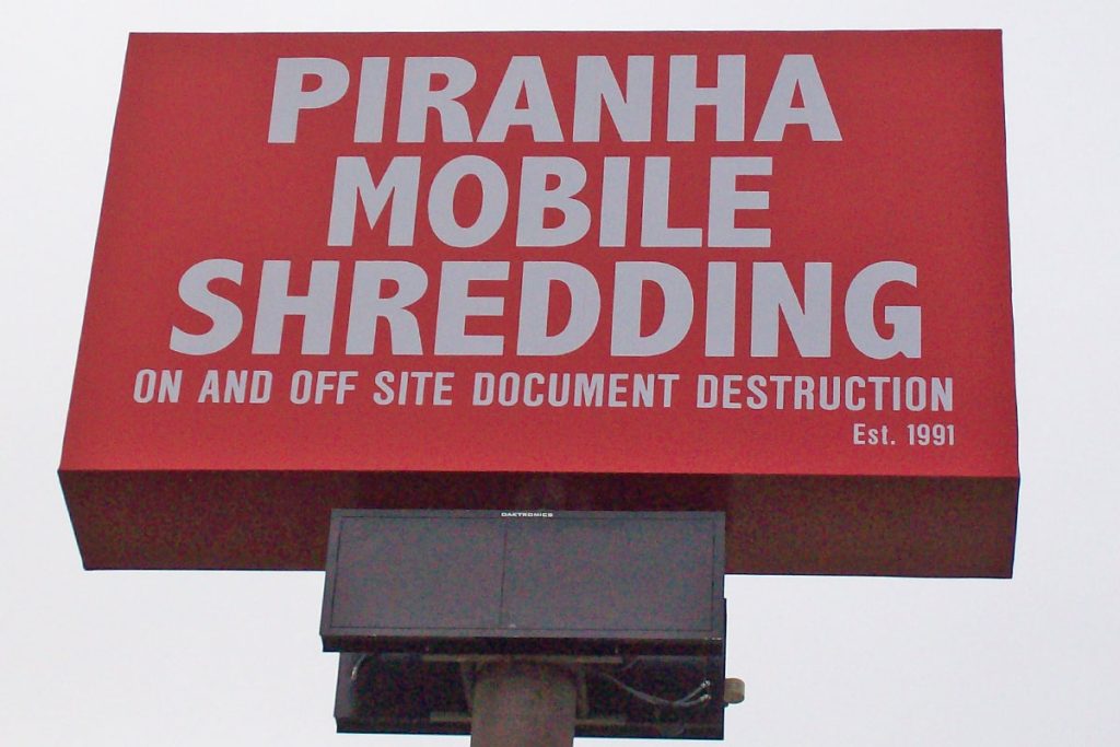 Piranha Mobile Shredding Pole Sign